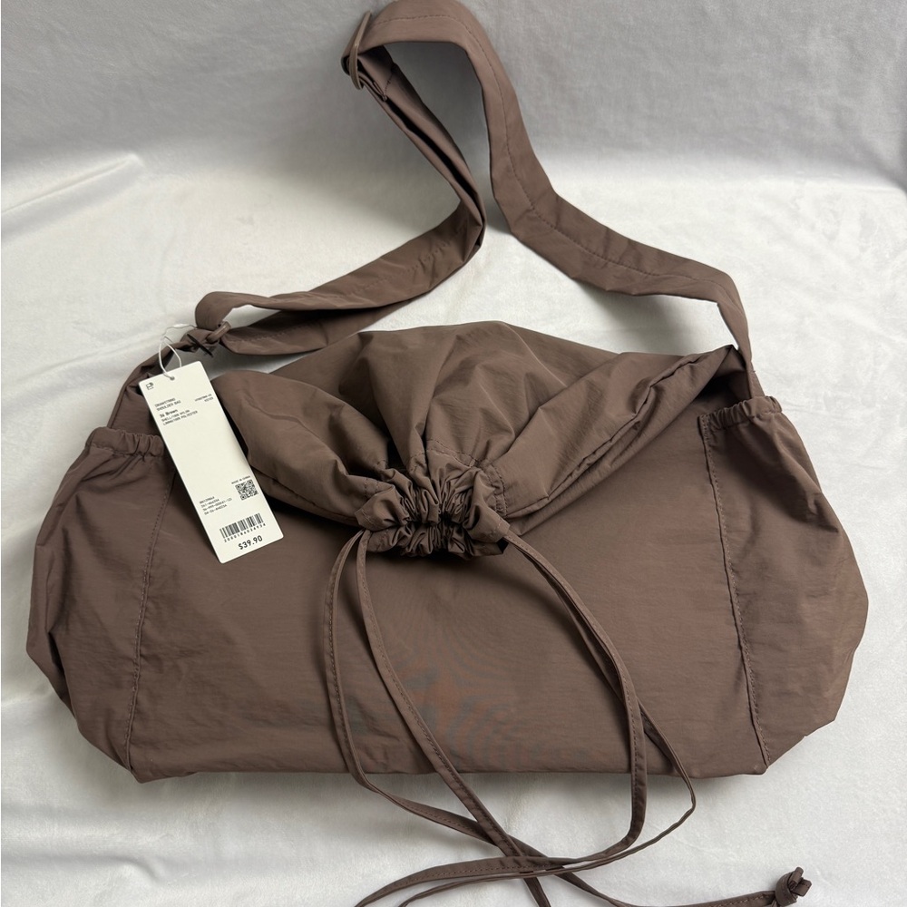 Uniqlo Taupe Crossbody Bag drawstring shoulder bag